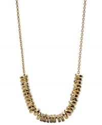 Go for the gold tones. Fossil's necklace, crafted from gold-tone mixed metal, dazzles with sparkling black accents for a shining statement. Approximate length: 16 inches + 2-inch extender. Go for the gold tones. Fossil's necklace, crafted from gold-tone mixed metal, dazzles with sparkling black accents for a shining statement. Approximate length: 16 inches + 2-inch extender.