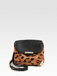 A petite style in luxurious animal print haircalf accented with smooth leather.Detachable adjustable leather shoulder strap, 20-23 dropSlide-lock flap closureProtective metal feetThree inner compartmentsFully lined9W X 7½H X 4DImported A petite style in luxurious animal print haircalf accented with smooth leather.Detachable adjustable leather shoulder strap, 20-23 dropSlide-lock flap closureProtective metal feetThree inner compartmentsFully lined9W X 7½H X 4DImported