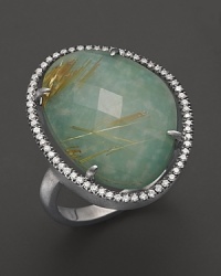 Diamonds circle a faceted rutilated quartz and green amazonite doublet in a sterling silver band. By Di Massima. Diamonds circle a faceted rutilated quartz and green amazonite doublet in a sterling silver band. By Di Massima.