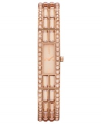 Shimmering crystal accents and rose-gold hues create a lovely presence on this DKNY watch. Shimmering crystal accents and rose-gold hues create a lovely presence on this DKNY watch.