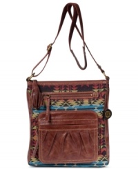 Add some bohemian-chic to your everyday accessorizing with this go-anywhere crossbody design from The Sak. Super soft leather juxtaposes with oversized zipper pulls and bold pattern for a look that's utilitarian-inspired yet still laid-back. Add some bohemian-chic to your everyday accessorizing with this go-anywhere crossbody design from The Sak. Super soft leather juxtaposes with oversized zipper pulls and bold pattern for a look that's utilitarian-inspired yet still laid-back.
