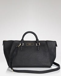 The satchel is the handbag no closet should be without, and this piece from DKNY masters the look in Saffiano finished leather. Office, off-duty, or running around town, it styles your look classic. The satchel is the handbag no closet should be without, and this piece from DKNY masters the look in Saffiano finished leather. Office, off-duty, or running around town, it styles your look classic.