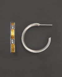 Artful sterling silver hoop earrings with diamonds and hammered 24K yellow gold stations. From Gurhan. Artful sterling silver hoop earrings with diamonds and hammered 24K yellow gold stations. From Gurhan.