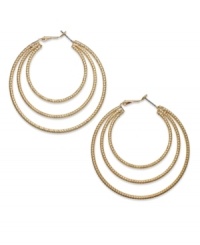 Good things come in threes. INC International Concepts layers on the style in this pair of hoop earrings. Crafted from gold-tone mixed metal. Approximate diameter: 2-1/2 inches. Good things come in threes. INC International Concepts layers on the style in this pair of hoop earrings. Crafted from gold-tone mixed metal. Approximate diameter: 2-1/2 inches.