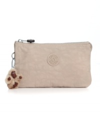 An easy-going wristlet, perfect for the gal on the go. Stash all your goodies in this easy-going design. An adorable monkey keychain completes this fun-loving look. An easy-going wristlet, perfect for the gal on the go. Stash all your goodies in this easy-going design. An adorable monkey keychain completes this fun-loving look.