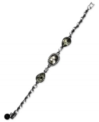 Subtle chic. Givenchy's flex bracelet is crafted from hematite-tone mixed metal with glass stones and cubic zirconia accents adding an elegant touch. Approximate length: 7-1/4 inches. Subtle chic. Givenchy's flex bracelet is crafted from hematite-tone mixed metal with glass stones and cubic zirconia accents adding an elegant touch. Approximate length: 7-1/4 inches.