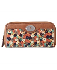 Vibrant prints and helpful details make this Fossil wallet stylish and useful. Vibrant prints and helpful details make this Fossil wallet stylish and useful.
