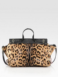 Take a walk on the wild side with this roomy shape covered in soft leopard-printed pony hair, topped off with sleek leather accents. Double leather top handles, 3¼ dropLeather shoulder strap, 12½ dropMagnetic snap closureOne inside zip pocketCotton lining21W X 11H X 8½DImported Take a walk on the wild side with this roomy shape covered in soft leopard-printed pony hair, topped off with sleek leather accents. Double leather top handles, 3¼ dropLeather shoulder strap, 12½ dropMagnetic snap closureOne inside zip pocketCotton lining21W X 11H X 8½DImported