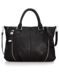 Classic style with modern detailing, this satchel from Calvin Klein is this season's go-to bag. Crafted from luxe leather with chic, silver-tone hardware, it's perfectly sized for all your fashionista essentials. Classic style with modern detailing, this satchel from Calvin Klein is this season's go-to bag. Crafted from luxe leather with chic, silver-tone hardware, it's perfectly sized for all your fashionista essentials.