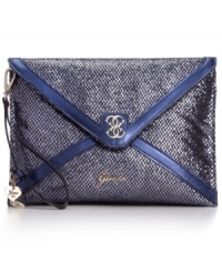Get your shine on with this shimmery clutch from GUESS that boasts a sleek envelope shape with signature accents. Super soft and sized for the essentials, it looks effortless under your arm. Get your shine on with this shimmery clutch from GUESS that boasts a sleek envelope shape with signature accents. Super soft and sized for the essentials, it looks effortless under your arm.