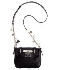 Find the one you've been waiting for with the Amour crossbody from GUESS. Fun miniature charms dangle from the chain embellished strap while a signature front plaque graces the front flap. Find the one you've been waiting for with the Amour crossbody from GUESS. Fun miniature charms dangle from the chain embellished strap while a signature front plaque graces the front flap.