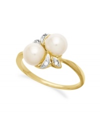 A natural choice. This ring, crafted from 10k gold, exudes elegance with cultured freshwater pearls and diamond accents along a whimsical leaf motif. Approximate size: 3/4 inch. A natural choice. This ring, crafted from 10k gold, exudes elegance with cultured freshwater pearls and diamond accents along a whimsical leaf motif. Approximate size: 3/4 inch.
