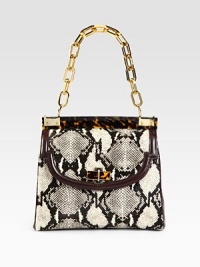 An illusion of luxurious proportions, this snake printed calf hair design is trimmed in smooth leather, glossy resin and radiant hardware.Resin chain shoulder strap, 8½ dropMagnetic snap flap closureOne zip and two open inner compartmentsOne inside zip pocketTwo inside open pocketsCanvas lining11W X 8H X 5DImported An illusion of luxurious proportions, this snake printed calf hair design is trimmed in smooth leather, glossy resin and radiant hardware.Resin chain shoulder strap, 8½ dropMagnetic snap flap closureOne zip and two open inner compartmentsOne inside zip pocketTwo inside open pocketsCanvas lining11W X 8H X 5DImported