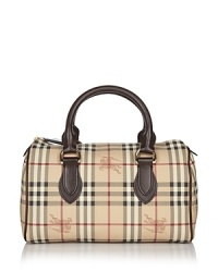 Printed coated canvas satchel with leather trim double handles. Top zip closure. Inside zip pocket. Lined. Printed coated canvas satchel with leather trim double handles. Top zip closure. Inside zip pocket. Lined.