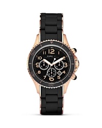 Give your hourly look a hit of MARC BY MARC JACOBS' style with this rose-gold accented watch. Equal parts sporty and sleek, it features a silicone wrapped bracelet and advanced chronograph movement. Give your hourly look a hit of MARC BY MARC JACOBS' style with this rose-gold accented watch. Equal parts sporty and sleek, it features a silicone wrapped bracelet and advanced chronograph movement.