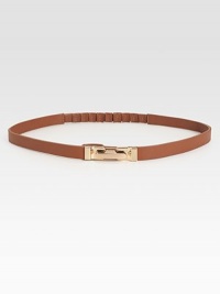 Waist defining and beyond chic, this leather skinny belt is flawlessly complemented by a brass buckle.Brass buckleLeatherLength, 27Width, ½Imported Waist defining and beyond chic, this leather skinny belt is flawlessly complemented by a brass buckle.Brass buckleLeatherLength, 27Width, ½Imported