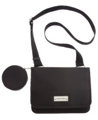 Sleek and sized-right for daily endeavors, this sublime silhouette from Franco Sarto is a city girl essential. Durable nylon is outfitted with plenty of pockets and signature accents, while the convenient crossbody strap offers on-the-go ease. Sleek and sized-right for daily endeavors, this sublime silhouette from Franco Sarto is a city girl essential. Durable nylon is outfitted with plenty of pockets and signature accents, while the convenient crossbody strap offers on-the-go ease.