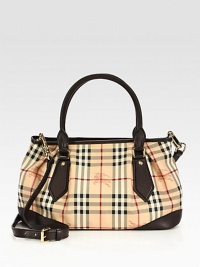An iconic check print on durable coated canvas with luxuriously smooth leather trim.Double leather top handles, 5 dropDetachable adjustable leather shoulder strap, 21¼-24½ dropTop zip closureOne inside zip pocketTwo inside open pocketsCotton lining13½W X 9H X 5½DMade in Italy An iconic check print on durable coated canvas with luxuriously smooth leather trim.Double leather top handles, 5 dropDetachable adjustable leather shoulder strap, 21¼-24½ dropTop zip closureOne inside zip pocketTwo inside open pocketsCotton lining13½W X 9H X 5½DMade in Italy