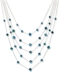 Find a colorful new level of style. This five-row illusion necklace by c.A.K.e by Ali Khan boasts turquoise-colored glass beads (10-12 mm). Set in gold tone mixed metal. Approximate length: 17 inches + 3-inch extender. Approximate drop: 6 inches. Find a colorful new level of style. This five-row illusion necklace by c.A.K.e by Ali Khan boasts turquoise-colored glass beads (10-12 mm). Set in gold tone mixed metal. Approximate length: 17 inches + 3-inch extender. Approximate drop: 6 inches.