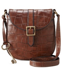 Give in to your animal instincts with this croc-embossed leather bag from Fossil, featuring brasstone hardware and signature detailing. Convenient crossbody strap keeps hands free for easy access to pockets and compartments within. Give in to your animal instincts with this croc-embossed leather bag from Fossil, featuring brasstone hardware and signature detailing. Convenient crossbody strap keeps hands free for easy access to pockets and compartments within.