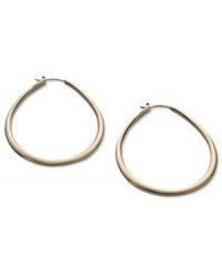 A classic hoop earring in a teardrop design from Fossil. Crafted in shiny gold tone stainless steel. Approximate diameter: 2-1/3 inches. A classic hoop earring in a teardrop design from Fossil. Crafted in shiny gold tone stainless steel. Approximate diameter: 2-1/3 inches.