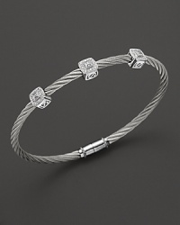 From the Classique Collection, a stackable bangle in white gold and stainless steel with diamond stations. Designed by Charriol. From the Classique Collection, a stackable bangle in white gold and stainless steel with diamond stations. Designed by Charriol.