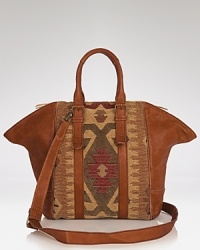 Isabella Fiore crafts this textured, go-everywhere satchel using leather with a hint of woven fabric. A mix of crafty and cool, it lends an instant hit of luxe bohemian style. Isabella Fiore crafts this textured, go-everywhere satchel using leather with a hint of woven fabric. A mix of crafty and cool, it lends an instant hit of luxe bohemian style.