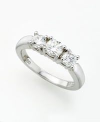 A symbol of classic luxury, this three stone ring features prong-set, round-cut diamonds (1 ct. t.w.). Diamond ring set in 18k white gold. A symbol of classic luxury, this three stone ring features prong-set, round-cut diamonds (1 ct. t.w.). Diamond ring set in 18k white gold.