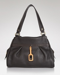 A ruggedly cool UGG® Australia carryall in pebbled leather - it's a consummate classic that you'll reach for day in and nights out. A ruggedly cool UGG® Australia carryall in pebbled leather - it's a consummate classic that you'll reach for day in and nights out.