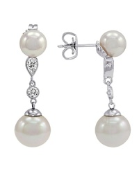 Shimmering organic pearls and sparkling cubic zirconia make a dramatic statement on these sterling silver drops. Shimmering organic pearls and sparkling cubic zirconia make a dramatic statement on these sterling silver drops.