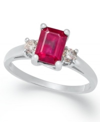 A cut above the rest. This stunning three-stone ring highlights an emerald-cut ruby (1-1/5 ct. t.w.) highlighted on either side by a round-cut diamond (1/5 ct. t.w.). Set in 14k white gold. A cut above the rest. This stunning three-stone ring highlights an emerald-cut ruby (1-1/5 ct. t.w.) highlighted on either side by a round-cut diamond (1/5 ct. t.w.). Set in 14k white gold.