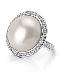 Take your jewel box in a classic direction with Crislu's pearl and cubic zirconia cocktail ring. Channel ladylike decadence, this bauble loves red lips and a dramatic gown. Take your jewel box in a classic direction with Crislu's pearl and cubic zirconia cocktail ring. Channel ladylike decadence, this bauble loves red lips and a dramatic gown.