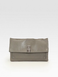 A sleek foldover bag, crafted from supple lambskin.Magnetic snap flap closureOne open pocket under flapOne inside zip pocketOne inside snap pocketLinen lining11½W X 7H X 3/4DMade in Italy A sleek foldover bag, crafted from supple lambskin.Magnetic snap flap closureOne open pocket under flapOne inside zip pocketOne inside snap pocketLinen lining11½W X 7H X 3/4DMade in Italy