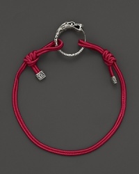 Eastern elements inform John Hardy's dragon head bracelet. It features a cotton cord band with an adjustable sliding closure. Eastern elements inform John Hardy's dragon head bracelet. It features a cotton cord band with an adjustable sliding closure.