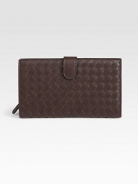 Stay organized in this sleek continental silhouette crafted from richly-woven leather.Front tab over top-zip closureTab compartment with two open pocketsOne zip pocket with two open compartmentsEight credit card slotsLeather lining6¾W X 4H X 1DMade in Italy Stay organized in this sleek continental silhouette crafted from richly-woven leather.Front tab over top-zip closureTab compartment with two open pocketsOne zip pocket with two open compartmentsEight credit card slotsLeather lining6¾W X 4H X 1DMade in Italy
