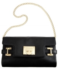 Opt for understated elegance with this captivating clutch design from MICHAEL Michael Kors. Crafted from sumptuous leather, signature golden hardware and belted detailing, its interior offers plenty of discrete pockets to keep evening essentials safe and secure. Opt for understated elegance with this captivating clutch design from MICHAEL Michael Kors. Crafted from sumptuous leather, signature golden hardware and belted detailing, its interior offers plenty of discrete pockets to keep evening essentials safe and secure.