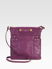 A slim and chic style in luxurious pebbled leather with radiant hardware.Adjustable shoulder strap, 17-19 dropTop zip closureThree outside open pocketsOne inside zip pocketTwo inside open pocketsFully lined9½W X 10H X ½DImported A slim and chic style in luxurious pebbled leather with radiant hardware.Adjustable shoulder strap, 17-19 dropTop zip closureThree outside open pocketsOne inside zip pocketTwo inside open pocketsFully lined9½W X 10H X ½DImported