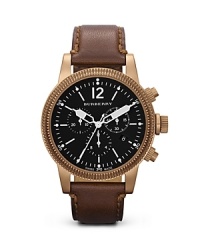 Whether at the beach, bar, or boardroom, this antique-gold finished Burberry watch makes an unforgettable impression, accented by a luxurious leather strap. Whether at the beach, bar, or boardroom, this antique-gold finished Burberry watch makes an unforgettable impression, accented by a luxurious leather strap.