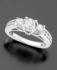 A three stone ring that gleams with elegance. This diamond ring features round- and brilliant-cut and diamonds (1-1/2 ct. t.w.) set in 14k white gold. A three stone ring that gleams with elegance. This diamond ring features round- and brilliant-cut and diamonds (1-1/2 ct. t.w.) set in 14k white gold.