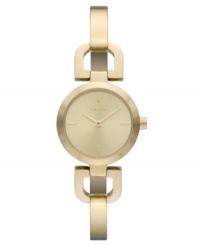 DKNY takes a ladylike turn with this golden bangle watch. DKNY takes a ladylike turn with this golden bangle watch.