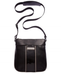 Petite and posh, this hands-free design from Calvin Klein is perfect when you're on-the-go. Crafted from soft leather with plenty of pockets, it's ideal for work, weekends, or whenever. Petite and posh, this hands-free design from Calvin Klein is perfect when you're on-the-go. Crafted from soft leather with plenty of pockets, it's ideal for work, weekends, or whenever.