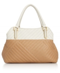 Make a definitive style statement with this decidedly elegant design from Calvin Klein. Sumptuous leather, golden hardware and detail stitching adorn the outside, while the pocket-lined interior offers exquisite organization. Make a definitive style statement with this decidedly elegant design from Calvin Klein. Sumptuous leather, golden hardware and detail stitching adorn the outside, while the pocket-lined interior offers exquisite organization.