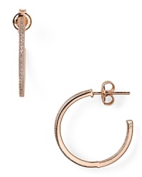 Rimmed in cubic zirconia stones, Crislu's rose gold-finished hoop earrings are a classic choice whether worn with denim or more swank with a little black dress and heels. Rimmed in cubic zirconia stones, Crislu's rose gold-finished hoop earrings are a classic choice whether worn with denim or more swank with a little black dress and heels.