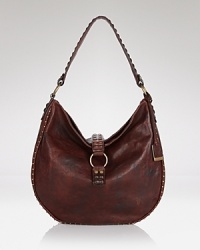 Equal parts lived-in and luxe, this leather hobo from Frye encapsulates the heritage brand's boundless, boho aesthetic. Equal parts lived-in and luxe, this leather hobo from Frye encapsulates the heritage brand's boundless, boho aesthetic.