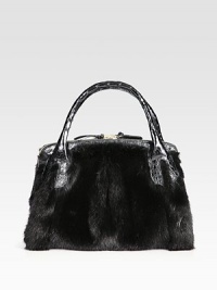 Be indulgent with this mink design accented with luxurious crocodile skin.Double crocodile skin top handles, 5 dropMagnetic top closureFive inner compartments; three zippered and two openOne inside zip pocketThree inside open pocketsSuede lining12½W X 10H X 4½DImported Be indulgent with this mink design accented with luxurious crocodile skin.Double crocodile skin top handles, 5 dropMagnetic top closureFive inner compartments; three zippered and two openOne inside zip pocketThree inside open pocketsSuede lining12½W X 10H X 4½DImported