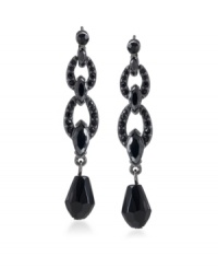 Let bold black earrings make a dramatic statement for you. This linear-style design by Carolee feature jet glass stones in multiple shapes and sizes. Earrings feature a double loop and dangling faceted teardrop. Crafted in hematite-plated mixed metal. Surgical steel posts. Approximate drop: 1-7/8 inches. Let bold black earrings make a dramatic statement for you. This linear-style design by Carolee feature jet glass stones in multiple shapes and sizes. Earrings feature a double loop and dangling faceted teardrop. Crafted in hematite-plated mixed metal. Surgical steel posts. Approximate drop: 1-7/8 inches.