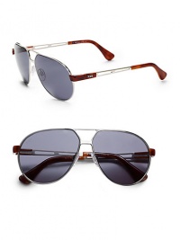THE LOOKMetal navigator style Cutout bridgeLogo accented temples Cutout details on arms Accented end pieces UVA and UVB protectionSignature case includedORIGINMade in Italy THE LOOKMetal navigator style Cutout bridgeLogo accented temples Cutout details on arms Accented end pieces UVA and UVB protectionSignature case includedORIGINMade in Italy