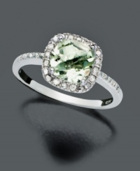 Indulge in gorgeous, green luxury. Cushion-cut green quartz (1-1/4 ct. t.w) takes on the sparkle of saltwater alongside round-cut diamond accents (1/10 ct. t.w.). Victoria Townsend ring crafted in sterling silver. Size 7. Indulge in gorgeous, green luxury. Cushion-cut green quartz (1-1/4 ct. t.w) takes on the sparkle of saltwater alongside round-cut diamond accents (1/10 ct. t.w.). Victoria Townsend ring crafted in sterling silver. Size 7.