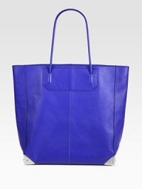 Stash your essentials in this roomy carryall, crafted from sleek leather with polished rhodium hardware.Shoulder straps, 8 dropProtective metal feetOne inner zip coin purseTwo inside open pockets12½W X 13¾H X 4¼DImported Stash your essentials in this roomy carryall, crafted from sleek leather with polished rhodium hardware.Shoulder straps, 8 dropProtective metal feetOne inner zip coin purseTwo inside open pockets12½W X 13¾H X 4¼DImported