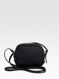A petite style in luxurious leather with two compartments.Adjustable shoulder strap, 25-27½ dropTwo zip compartmentsOne inside zip pocketSatin and leather lining6W X 5H X 2¾DMade in USA A petite style in luxurious leather with two compartments.Adjustable shoulder strap, 25-27½ dropTwo zip compartmentsOne inside zip pocketSatin and leather lining6W X 5H X 2¾DMade in USA